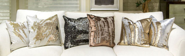 sequins mermaid pillows on white sofa