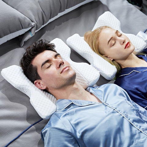 Male and Female lying in bed face up with Slow Rebound Pressure Foam Pillows underneath heads